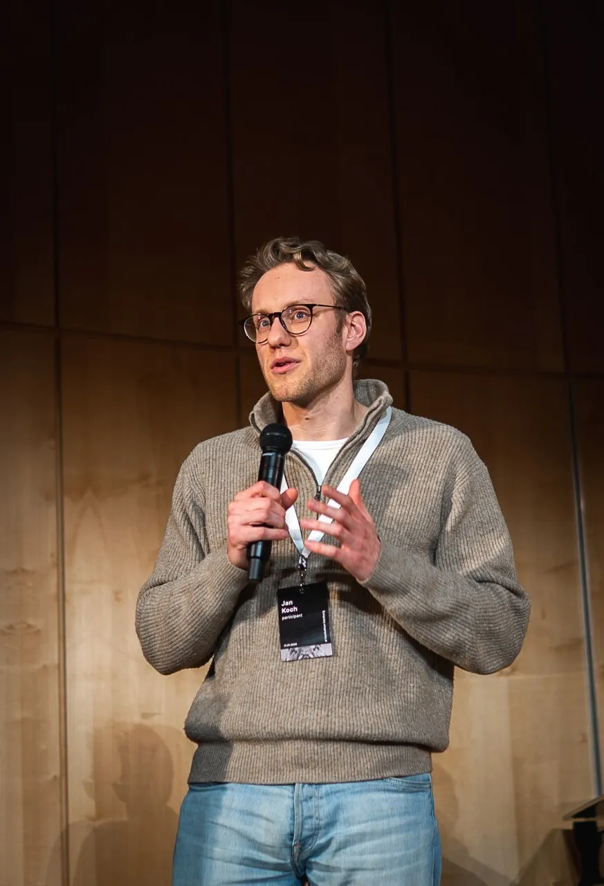 Jan speaking at the Cursor AI Hackathon in Hamburg, 2026